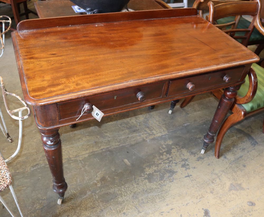 A Victorian mahogany two drawer side table, W.107cm, D.53cm, H.74cm